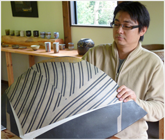 金井伸弥